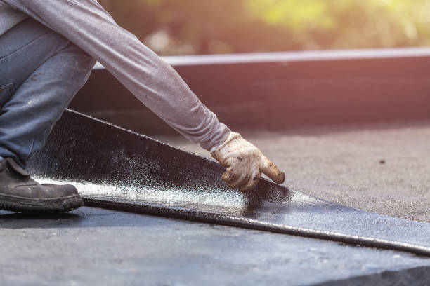 Professional Basement Waterproofing technician working in Barker, NY
